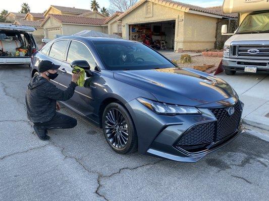 My man finishing up cleaning my baby