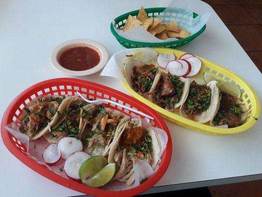 4 chicken and 4 carnitas tacos, without the onion. $1 each on Tuesday for happy hour. Came with free chips and salsa!