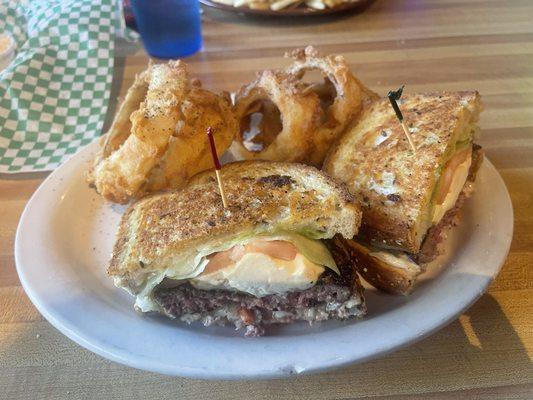 Loosey goosey burger with onion rings