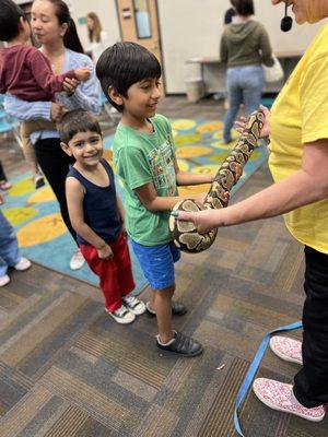 Holding snakes at the library!