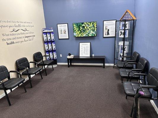 Our new waiting room. We now have a private adjusting rooms. We've found our clients prefer this over the open adjusting area.