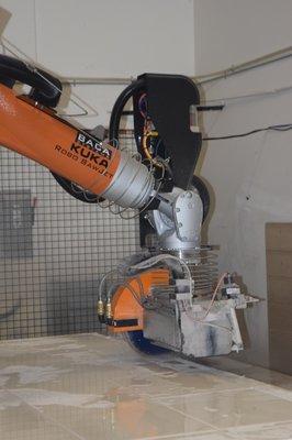 Robot Saw cutting Slabs with Diamond Blade.