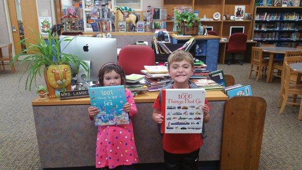 Our little helpers giving the books that HRC donated to Vinton Co. West Elementary