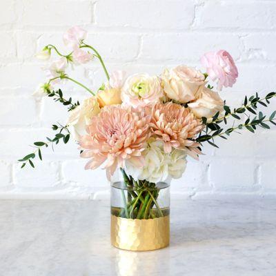 Exclusive for Valentines Day delivery. Our France Avenue arrangement features Ranunculus and delicate Sweet Peas to express your love.