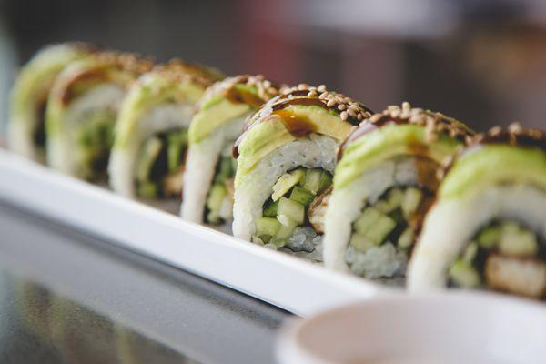 Baby Dragon Roll - Eel, Cucumber & Avocado topped with Sweet Soy Sauce and Sesame Seeds