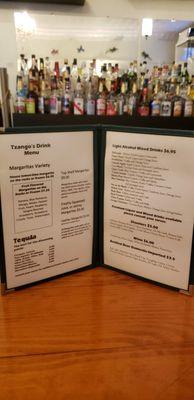 The drink menu sitting at the bar