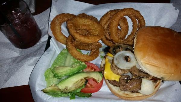 Classic burger with avocado, cheese, grilled onion, and grilled mushrooms, YUM!