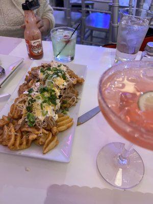 Loaded fries with pernil (so good!)  Partial pic of watermelon Margarita (also very good)