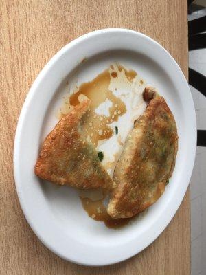 jiu cai he zi ( 韭菜盒子) Garlic Chive pockets (or the staff at JJ's call them potstickers). Outstanding!