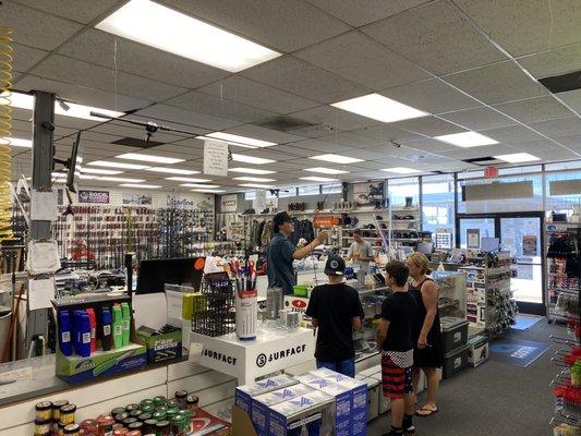 Wide shot of the shop. Plus, my family getting killer customer service.