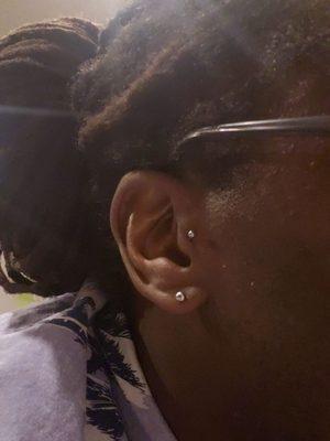 Got my tragus x2 done today pierced by Marisa