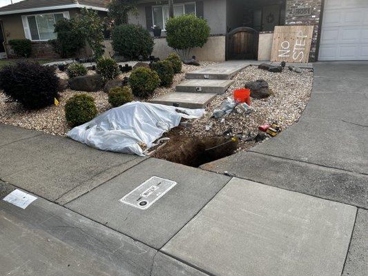 Trenchless water main replacement without damaging entire yard and landscaping.