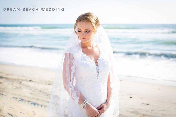 The bust lace of my dress placed  in exactly the same spot. My mothers veil with added trim from her dress as well!