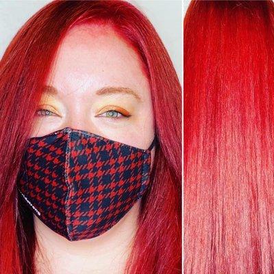 Vibrant red color on long hair by Carina