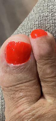 A horrible pedicure! Cuticles paint it, my toe nails, aren't shaped