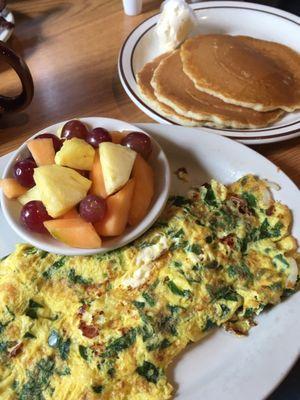 Spinach Feta omelette with fruit & cakes