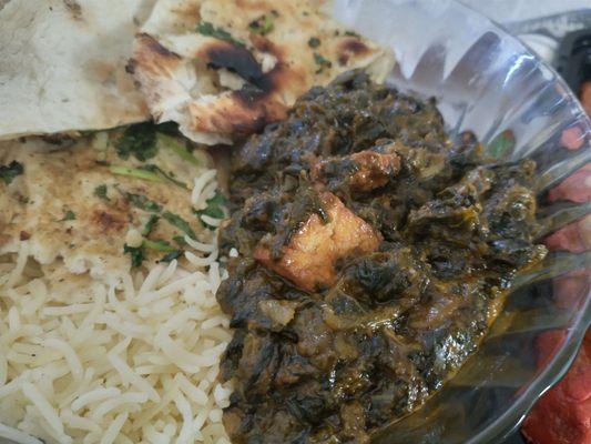 Saag paneer. I think this is frozen spinach. Lacks spice. It's strangely  sweet.