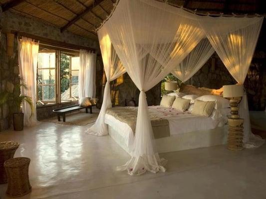 Canopy Bed and an All White Bedroom,...