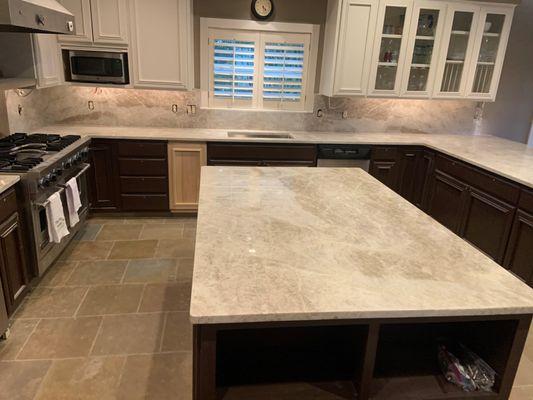 Beautiful Taj Mahal Quartzite countertops with full height backsplash.