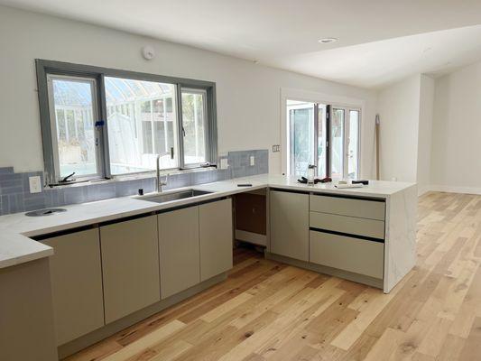 Behold the heart of a full house transformation - a modern kitchen that seamlessly marries style and functionality #ModernHome