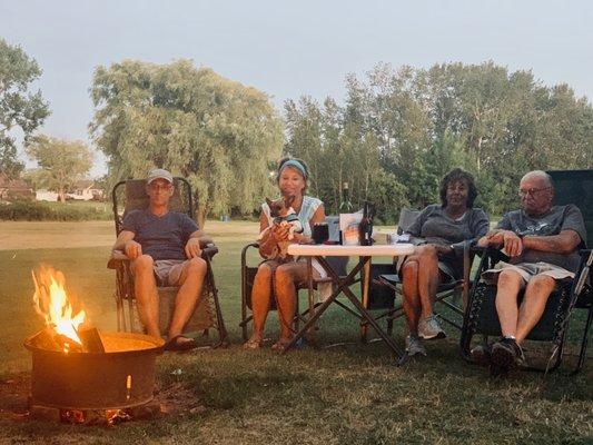 Campers enjoying a campfire