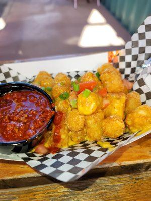 Rustic version of loaded tatertots...with red!