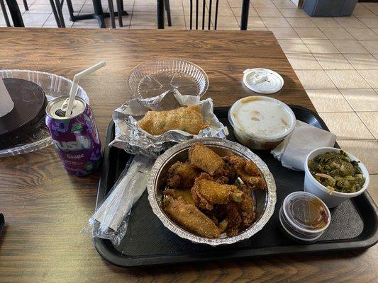 Jerk chicken soul roll, chicken wings, collards, banana pudding, and corn bread.