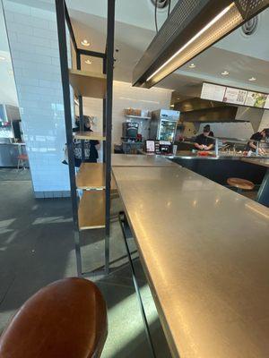 Empty Chipotle and our order was not even started until after app stated  complete.  Poor management!