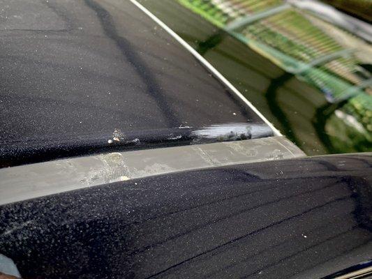 Trim on roof with excess glue and sanding scratches.