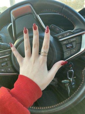 Cherry red rounded almond gel nails with tips