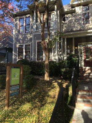 Dentist office is on a residential street and looks like a retro-fitted house