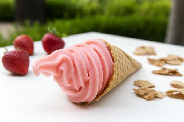 Strawberry Frozen Yogurt in a waffle cone