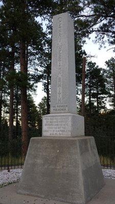 Stone marker dedicated to Preacher Smith