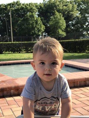 His first haircut! We didn't blow dry it at the salon since he was already not having it. We love how it looks!