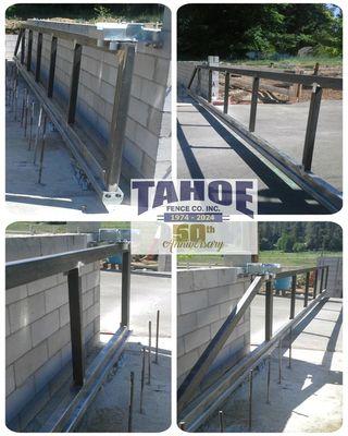 Bottom-Track Cantilever, Steel Frame Slide Gate by Tahoe Fence Adjacent to Masonry Wall at Glenbrook in Lake Tahoe (Douglas County.)