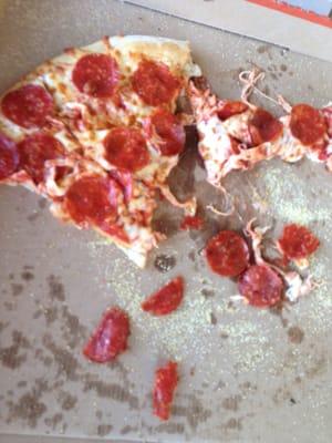 Our "hot and ready" $5 pizza that was so hot it fell apart when we attempted to pick up a slice.