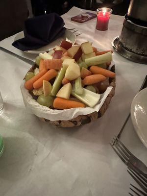 Variety basket for the cheese fondue. Comes with bread, apples, celery, grapes.