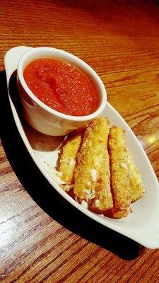 Homemade cheese sticks with homemade marinara