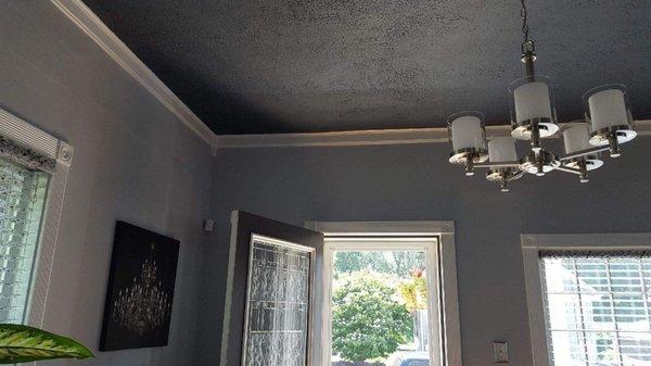 Two tone paint a light gray on the walls with a darker gray on the ceilings this color combination came out beautiful