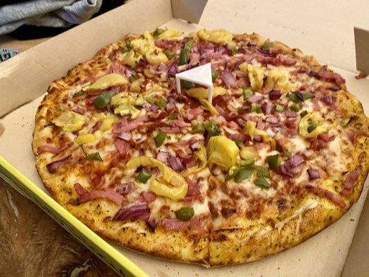 "Mystery Pizza" ham purple onions green peppers yellow banana peppers (I added fresh red chilies to it for a surprise) YUM! LOL