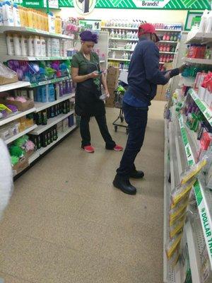 Dollar Tree employee on her cell phone having a personal conversation when she was on company time and on the floor.