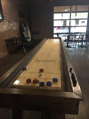 Shuffle board. I had never played. I'm actually pretty good! Was fun.