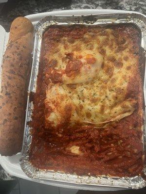 undercooked Lasagna with Italian Sausage with no ricotta cheese, no italian sausage and no noodles just raw sauce