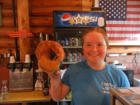 A doughnut as big as her head