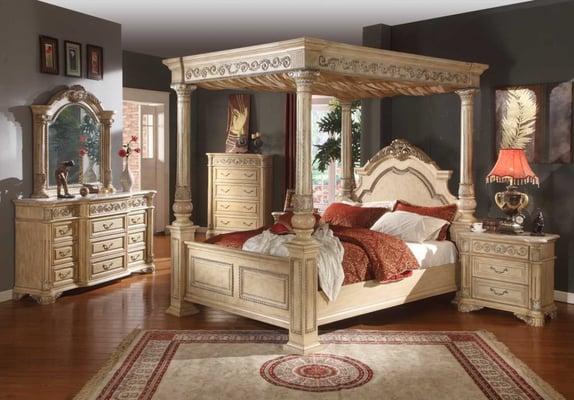 http://www.unitedfurnituregroup.com/sienna-marble-top-hand-carved-solid-wood-canopy-bedroom-set.html