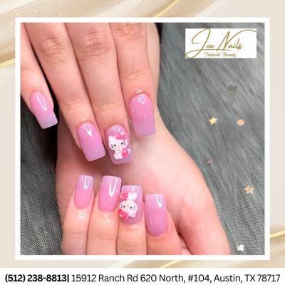 Pretty in pink with a touch of cuteness!  Check out these adorable Hello Kitty nails
   !