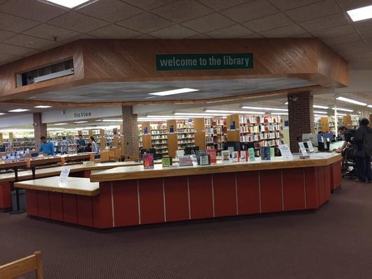 Friendly and not nearly as crowded as in NY but there were people in much of the library!