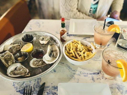 Oysters, blood orange margarita & complimentary truffle fries.