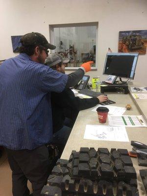 Service desk at OK Tire Store Watford City.