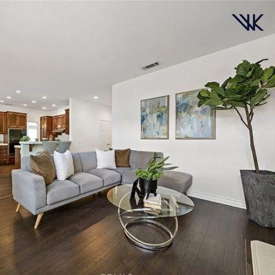 A little staging can go a long way when listing and selling a property! This living room feels a lot more home-y with furniture.